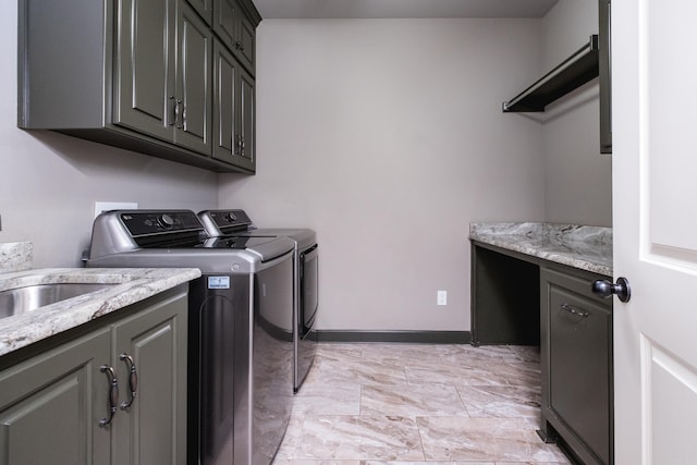 14 Cypress Valley Ct, Maumelle, AR 72113 - laundry area featuring washer and dryer, cabinet space, and baseboards