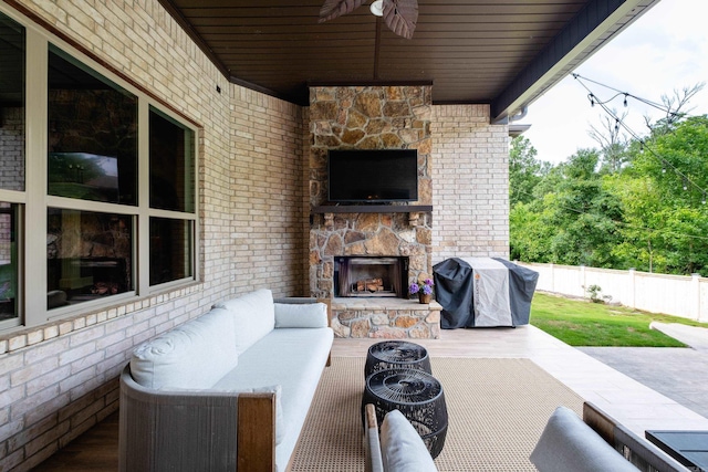 14 Cypress Valley Ct, Maumelle, AR 72113 - view of patio featuring grilling area, an outdoor living space with a fireplace, and a ceiling fan
