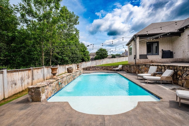 14 Cypress Valley Ct, Maumelle, AR 72113 - view of pool with a patio area and a fenced backyard