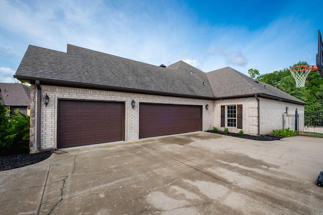 14 Cypress Valley Ct, Maumelle, AR 72113 - view of front of property featuring a shingled roof, an attached garage, brick siding, and driveway