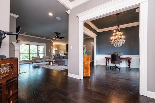 14 Cypress Valley Ct, Maumelle, AR 72113 - dining room featuring a chandelier, ceiling fan, crown molding, wood finished floors, and a wainscoted wall