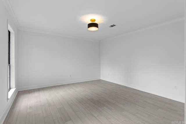 1208 Hilltop Rd, Alexander, AR 72022 - spare room with wood finished floors, ornamental molding, and baseboards