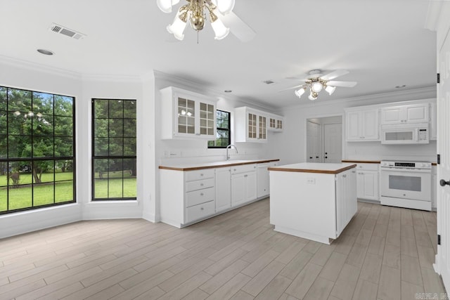 1208 Hilltop Rd, Alexander, AR 72022 - kitchen with white appliances, ceiling fan, glass insert cabinets, a sink, and crown molding