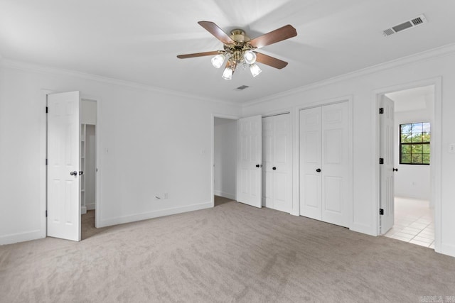 1208 Hilltop Rd, Alexander, AR 72022 - unfurnished bedroom featuring carpet flooring, two closets, ornamental molding, connected bathroom, and baseboards