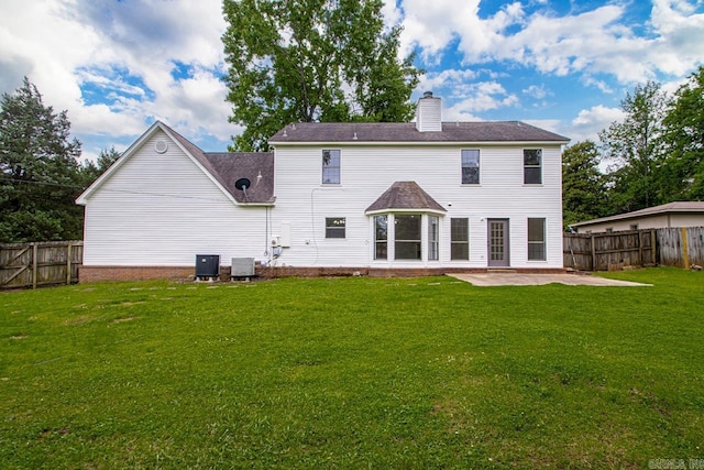 1208 Hilltop Rd, Alexander, AR 72022 - rear view of property with central AC unit, a patio area, and a chimney
