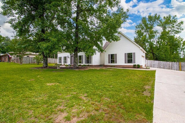 1208 Hilltop Rd, Alexander, AR 72022 - view of yard featuring driveway and a garage
