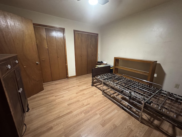 618 W Day St, Forrest City, AR 72335 - bedroom with two closets and light wood finished floors