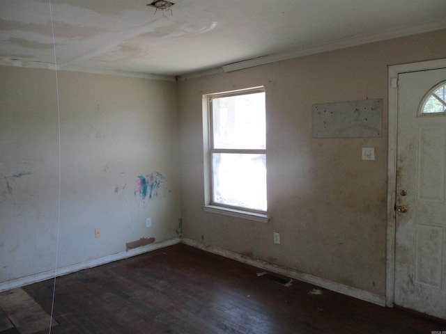 1001 Park St, North Little Rock, AR 72114 - entrance foyer featuring hardwood / wood-style flooring, crown molding, and baseboards