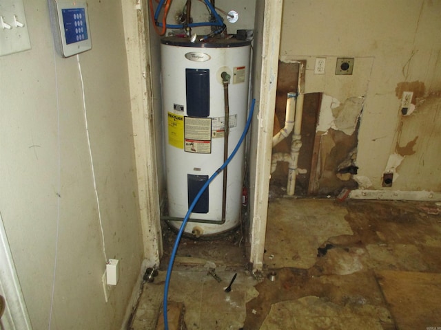 1001 Park St, North Little Rock, AR 72114 - utility room featuring electric water heater