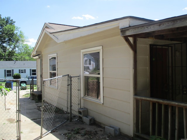 1001 Park St, North Little Rock, AR 72114 - view of side of property featuring a gate