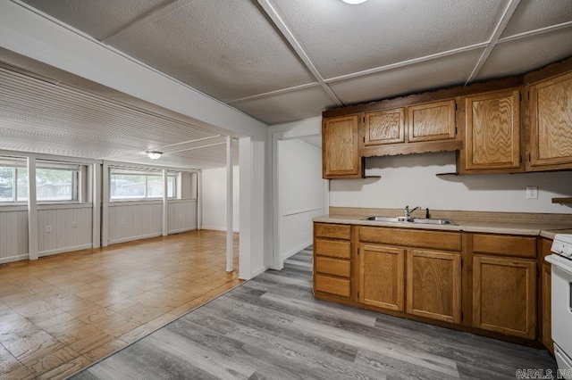 208 King Rd, Benton, AR 72019 - kitchen featuring a sink, brown cabinetry, light countertops, and white range