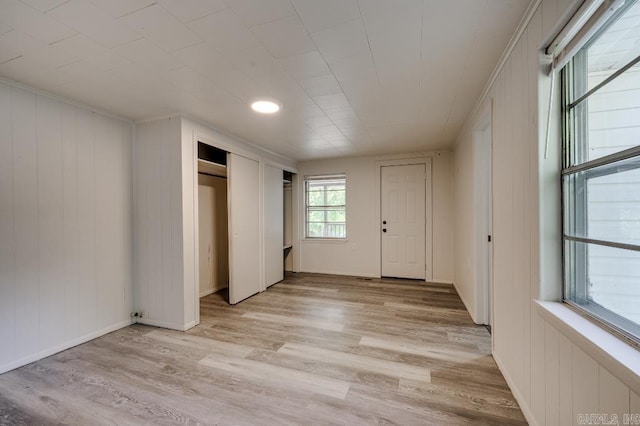 208 King Rd, Benton, AR 72019 - unfurnished bedroom featuring two closets and light wood-style flooring