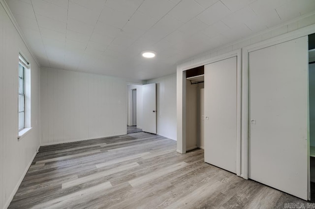 208 King Rd, Benton, AR 72019 - unfurnished bedroom with wood finished floors and baseboards