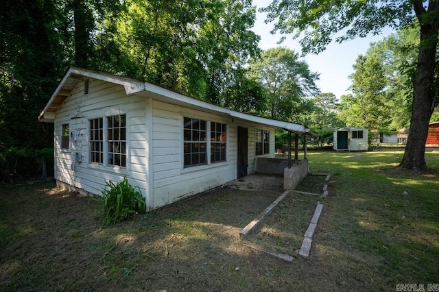 208 King Rd, Benton, AR 72019 - view of property exterior featuring a lawn