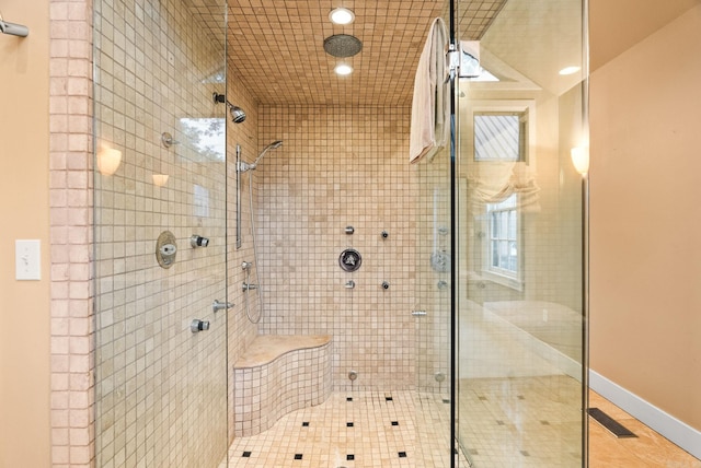 489 Ridgeway Dr, Little Rock, AR 72205 - full bathroom featuring a shower stall, tile patterned floors, and baseboards