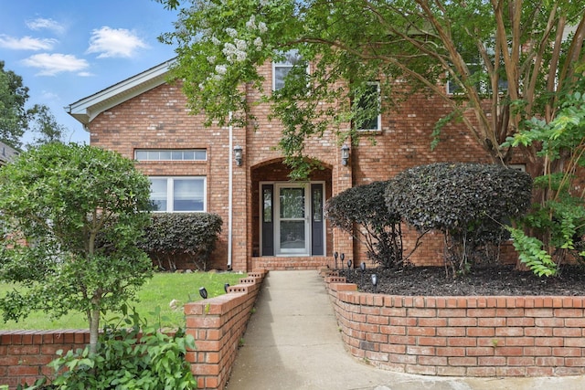 11 Crystal Mountain Ln, Maumelle, AR 72113 - view of exterior entry featuring brick siding