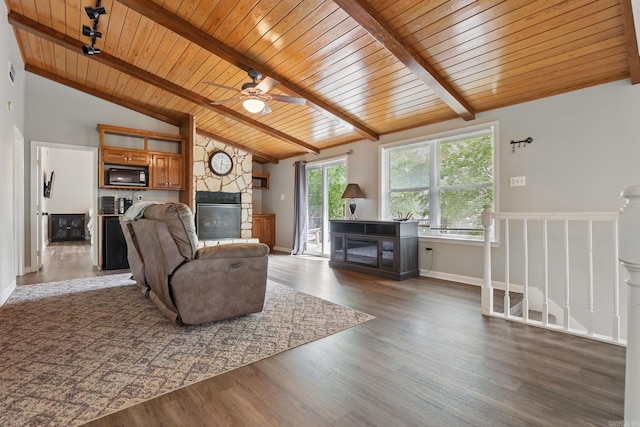 11 Crystal Mountain Ln, Maumelle, AR 72113 - living room with a fireplace, wood ceiling, dark wood finished floors, a ceiling fan, and baseboards
