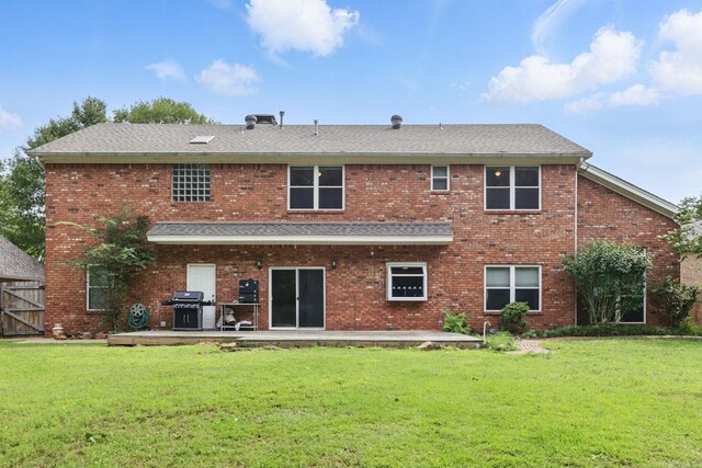 11 Crystal Mountain Ln, Maumelle, AR 72113 - rear view of house featuring a patio area, roof with shingles, and brick siding