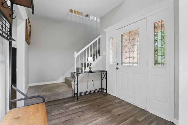 11 Crystal Mountain Ln, Maumelle, AR 72113 - foyer entrance featuring stairs, dark wood-style floors, and baseboards