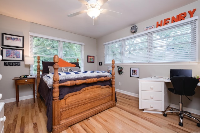 6709 Waverly Dr, Little Rock, AR 72207 - bedroom with light wood-type flooring, baseboards, an office area, and ceiling fan