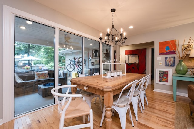 6709 Waverly Dr, Little Rock, AR 72207 - dining area featuring a chandelier, light wood-style flooring, baseboards, and recessed lighting