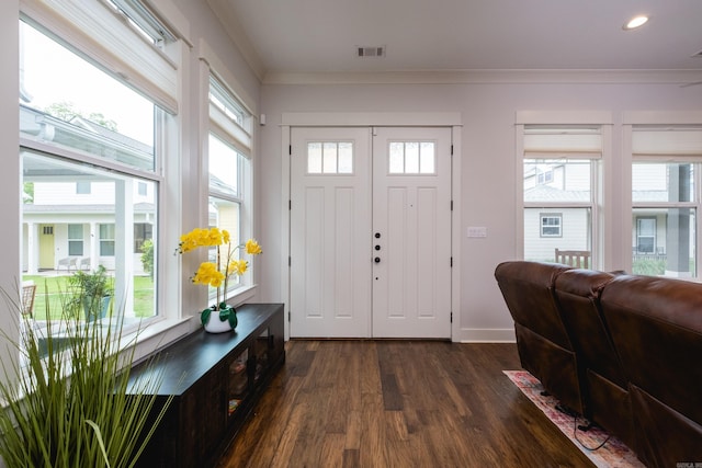 313 Parker St, North Little Rock, AR 72114 - foyer featuring ornamental molding, dark wood-style floors, baseboards, and recessed lighting
