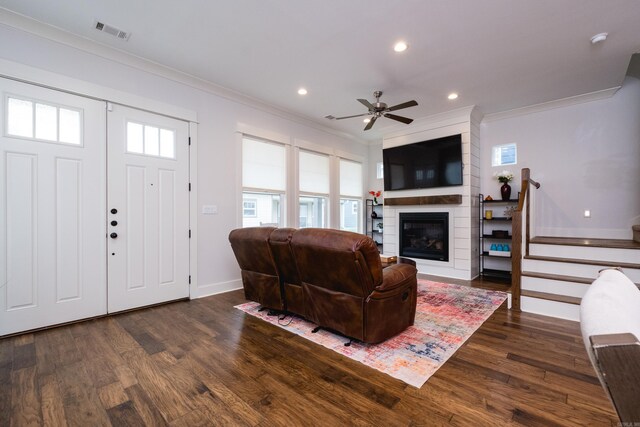 313 Parker St, North Little Rock, AR 72114 - living room with crown molding, dark wood-style flooring, baseboards, ceiling fan, and recessed lighting