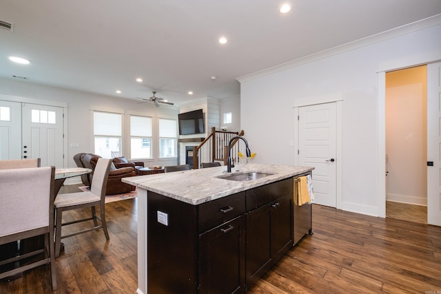 313 Parker St, North Little Rock, AR 72114 - kitchen with a sink, crown molding, dark wood finished floors, recessed lighting, and ceiling fan