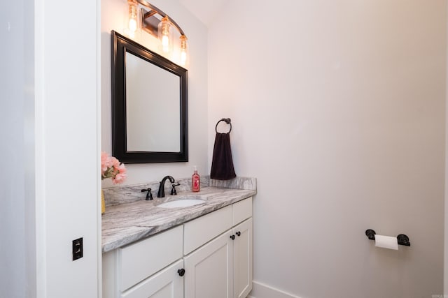 313 Parker St, North Little Rock, AR 72114 - bathroom with vanity and baseboards