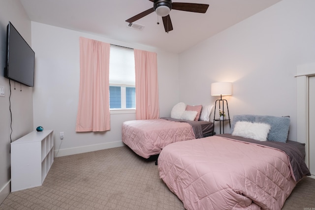 313 Parker St, North Little Rock, AR 72114 - carpeted bedroom with baseboards and ceiling fan