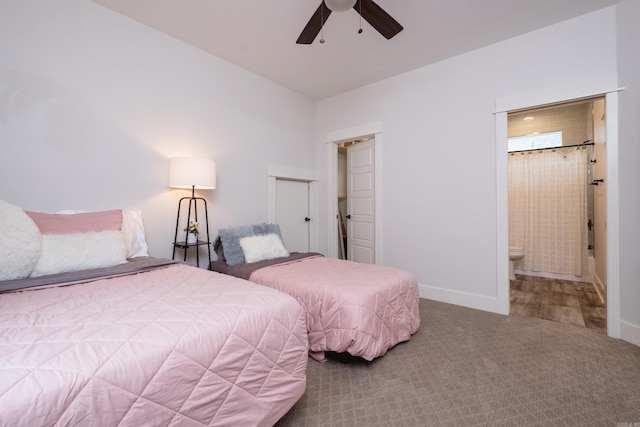 313 Parker St, North Little Rock, AR 72114 - bedroom with carpet, baseboards, ensuite bathroom, and ceiling fan
