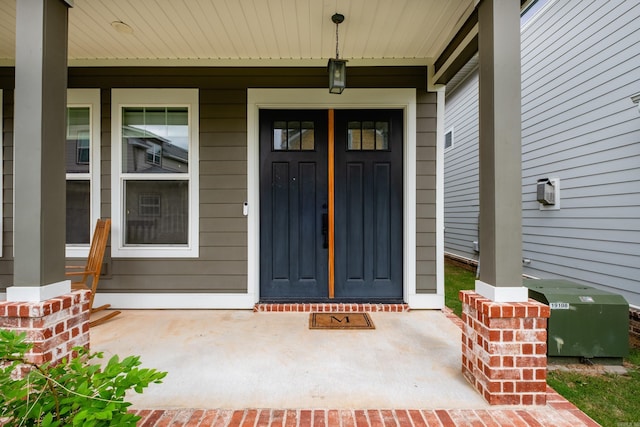 313 Parker St, North Little Rock, AR 72114 - view of exterior entry featuring covered porch