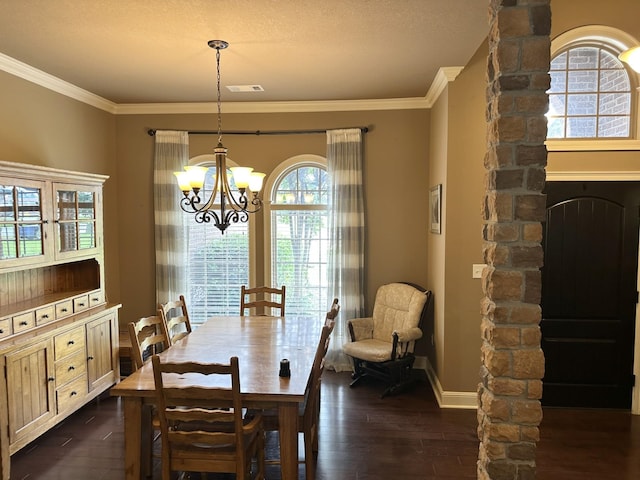 dining area featuring a chandelier, dark wood-style flooring, ornamental molding, and baseboards