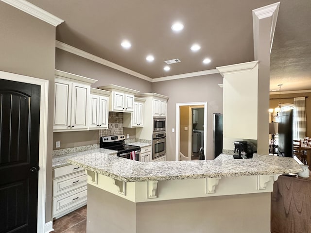 kitchen with stainless steel appliances, a breakfast bar, ornamental molding, a peninsula, and light stone counters