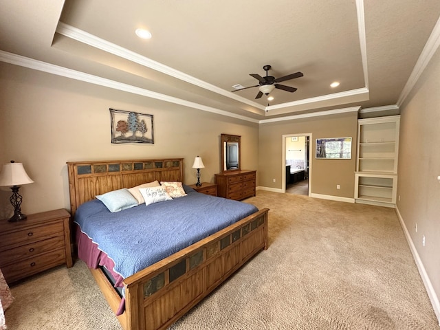 bedroom featuring a tray ceiling, light carpet, baseboards, ornamental molding, and recessed lighting