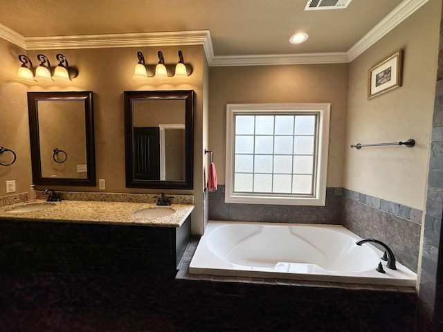full bathroom featuring a bath, double vanity, and crown molding