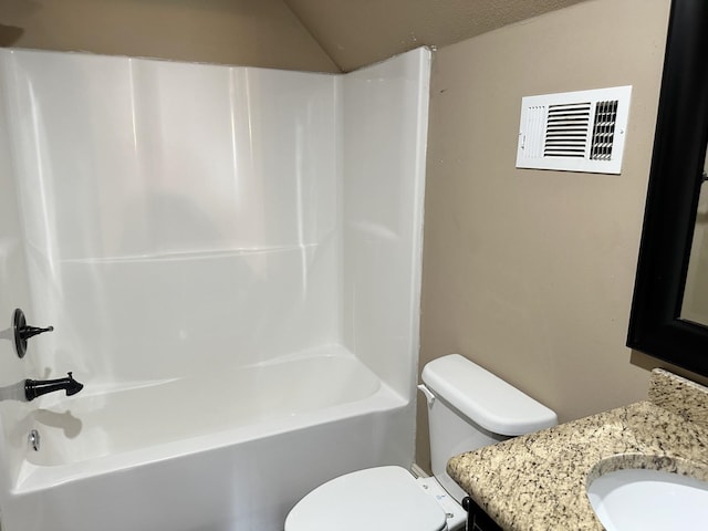 full bath with vanity, toilet, and bathtub / shower combination