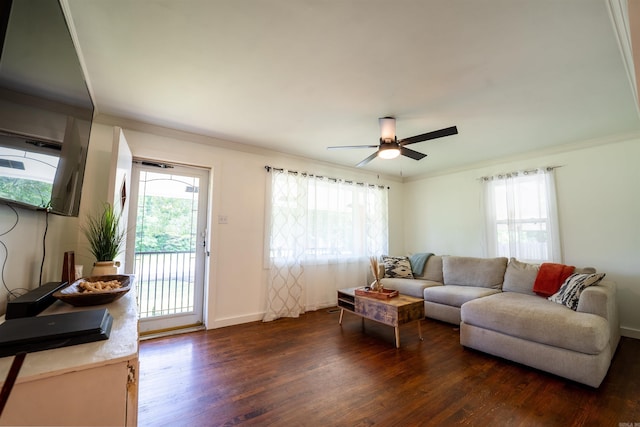 10111 Kling Rd, Mabelvale, AR 72103 - living area with dark wood-style flooring, ornamental molding, a ceiling fan, and baseboards