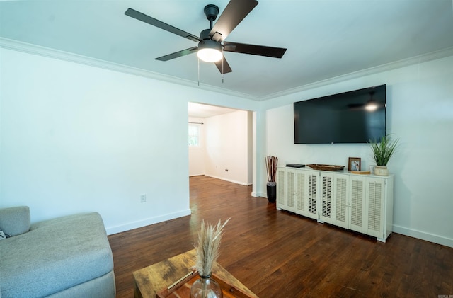 10111 Kling Rd, Mabelvale, AR 72103 - living area featuring crown molding, baseboards, wood finished floors, and ceiling fan