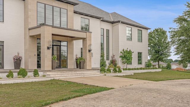 3307 Pruetts Chapel Rd, Paragould, AR 72450 - view of front of house featuring a front lawn