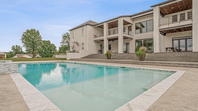 3307 Pruetts Chapel Rd, Paragould, AR 72450 - view of swimming pool with ceiling fan, a patio area, and a pool with connected hot tub