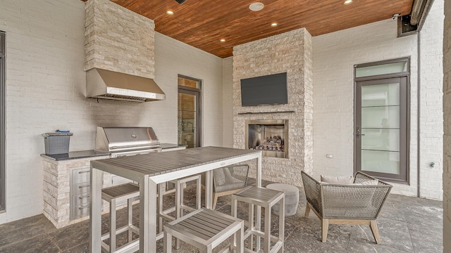 3307 Pruetts Chapel Rd, Paragould, AR 72450 - view of patio featuring an outdoor fireplace