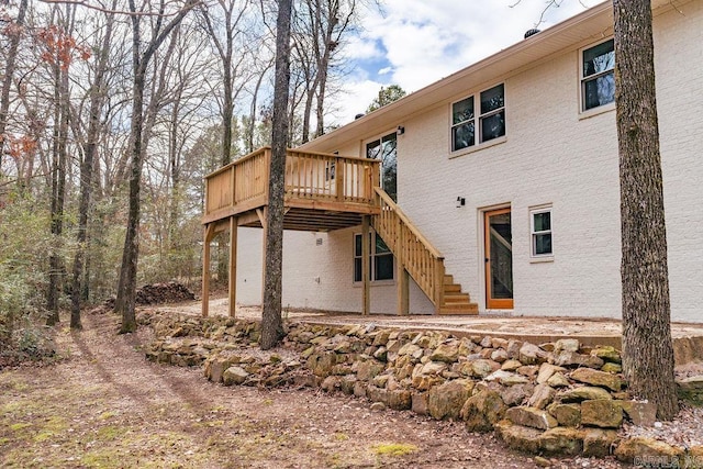 2529 Brandy Dr, Heber Springs, AR 72543 - rear view of house featuring stairs and a wooden deck