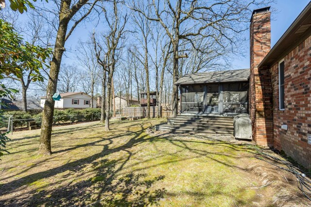 6005 Eagle Creek Rd, North Little Rock, AR 72116 - view of yard featuring a sunroom