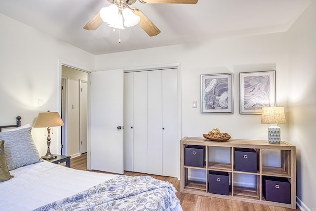 30 Segovia Dr, Hot Springs Village, AR 71909 - bedroom featuring wood finished floors, a closet, and ceiling fan