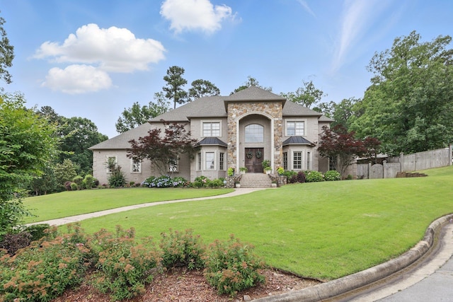 53 Maisons, Little Rock, AR 72223 - french country home featuring a standing seam roof, stone siding, and metal roof