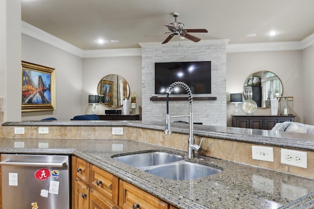 53 Maisons, Little Rock, AR 72223 - kitchen featuring stainless steel dishwasher, open floor plan, a sink, tasteful backsplash, and ornamental molding