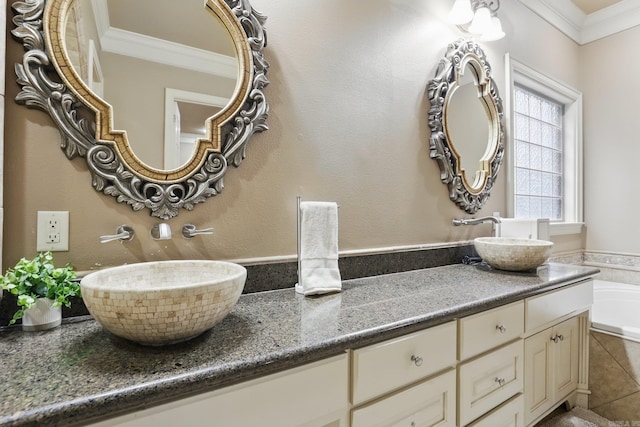 53 Maisons, Little Rock, AR 72223 - full bath with ornamental molding, double vanity, a tub, and tile patterned floors