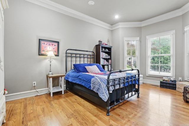 53 Maisons, Little Rock, AR 72223 - bedroom featuring light wood finished floors, baseboards, ornamental molding, and recessed lighting