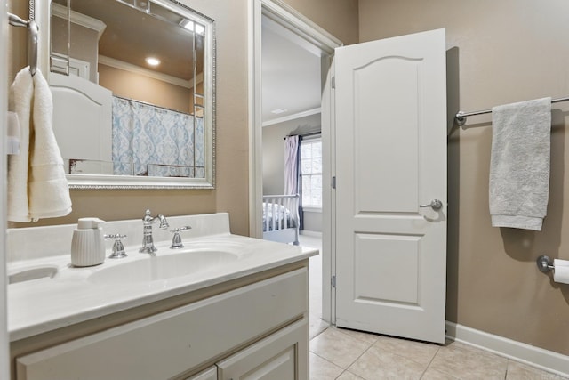 53 Maisons, Little Rock, AR 72223 - bathroom featuring crown molding, tile patterned flooring, vanity, and baseboards